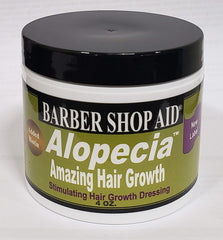D WRIGHT ALOPECIA biotin bottle closeup showing a nourishing scalp care formula.