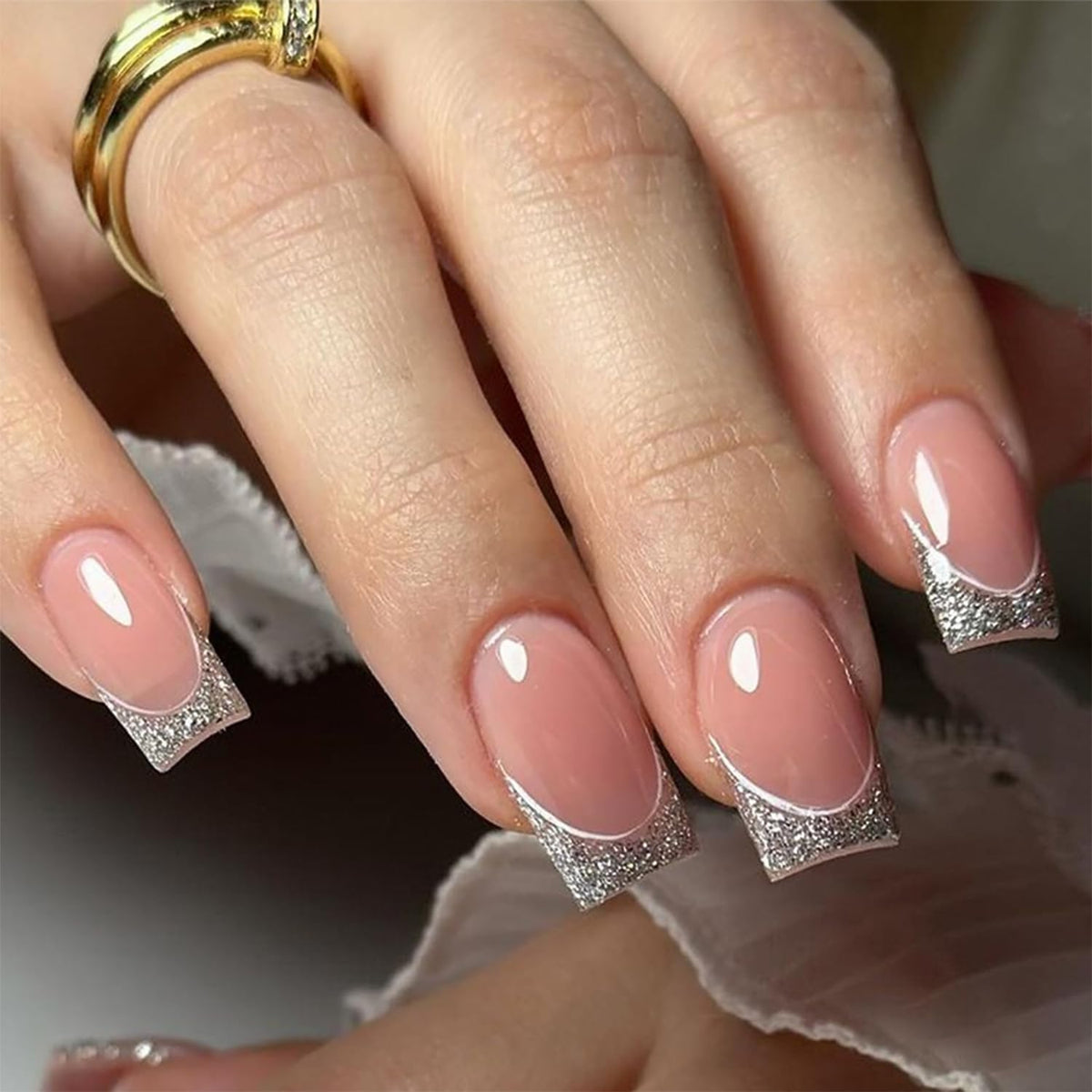 DZPGUONIZ Silver French Tip nails set in 24-piece packaging for home use