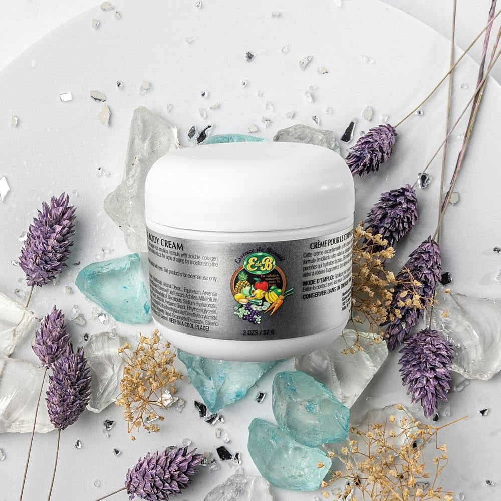 E de B Essence cream texture close-up highlights silky, moisturizing formula.