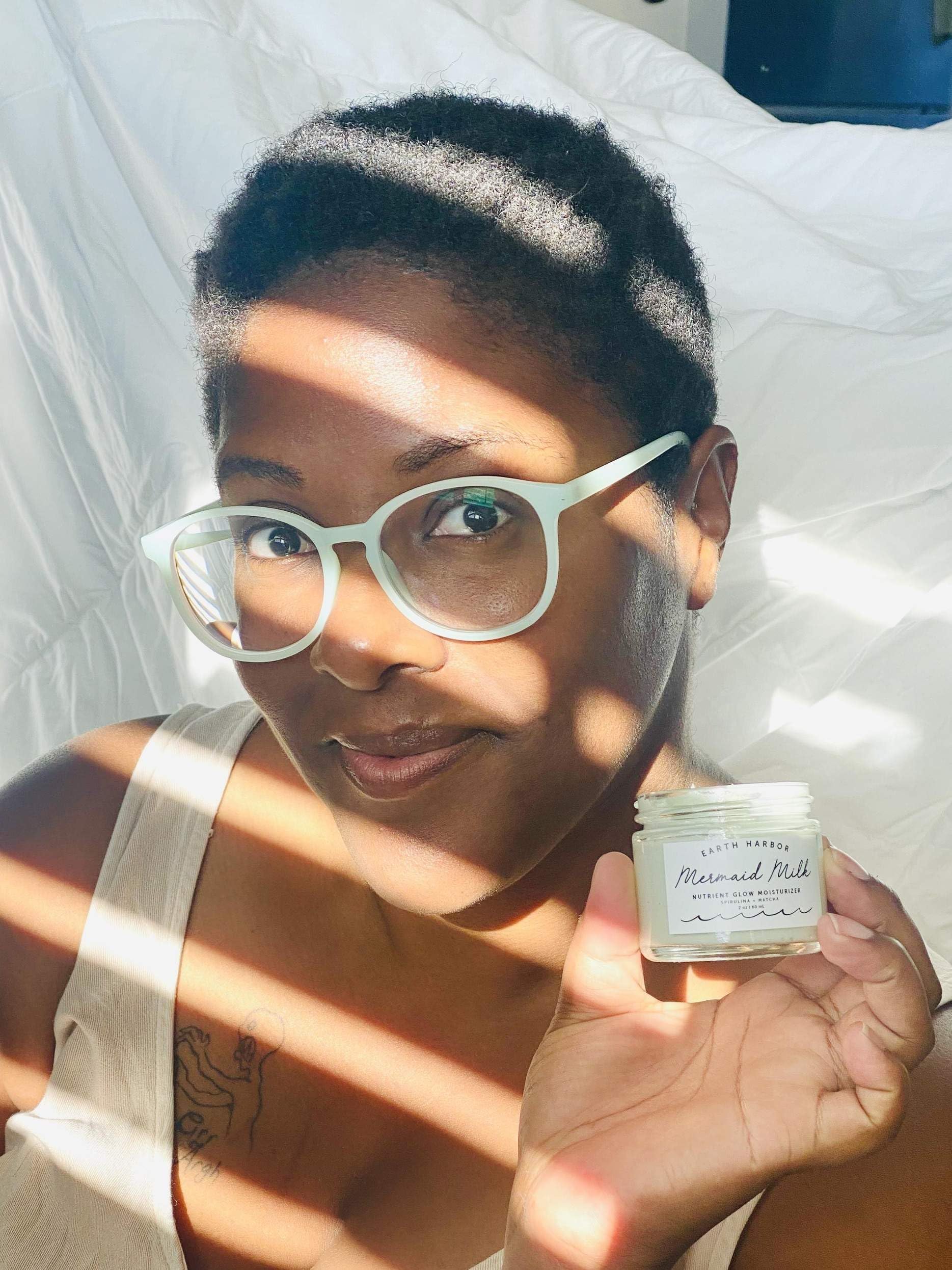 Mermaid Milk glowing on skin with a fresh, non-greasy finish