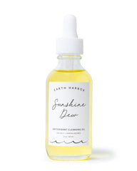 Earth Harbor Sunshine Dew bottle close-up for makeup removal and gentle cleansing