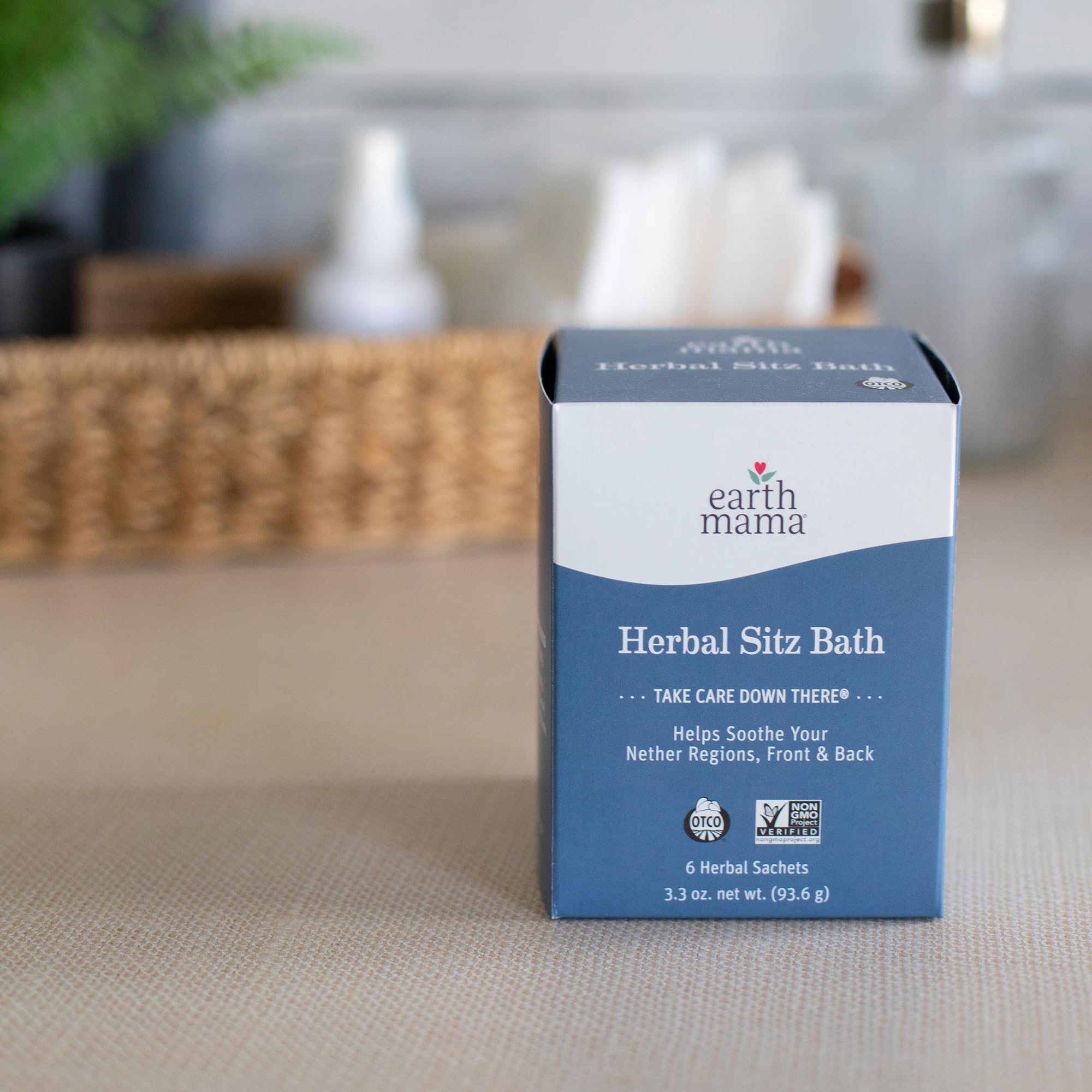 Postpartum care setup with Earth Mama sitz bath kit.