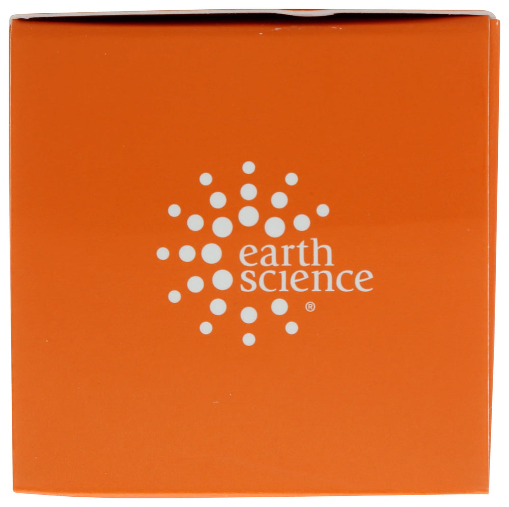 Earth Science Azulene Eye Cream being applied around the eye area for refreshment