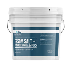 Earthborn Elements cashmere vanilla peach epsom salt in a jar for a soothing soak.