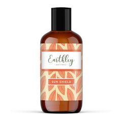 Earthley Wellness Sun Shield bottle front, gentle botanical moisturizer for daily skin nourishment