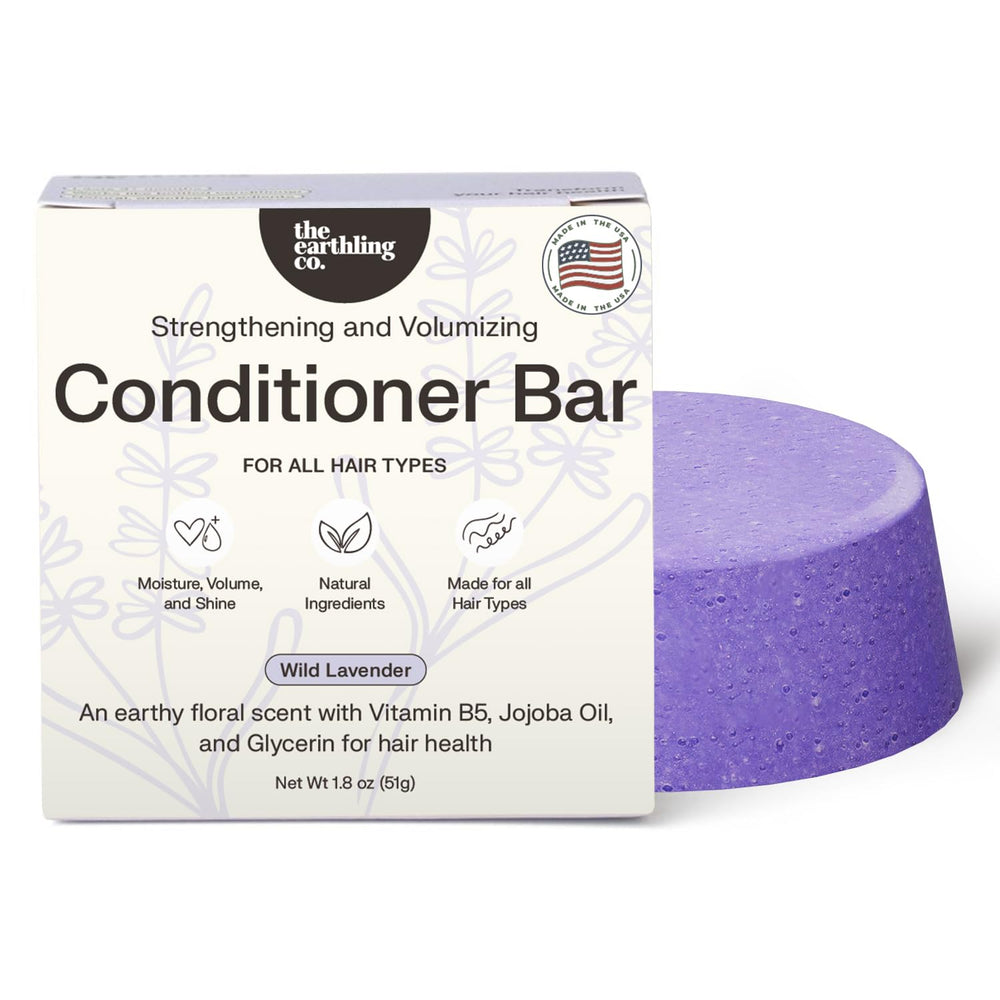 The Earthling Co. conditioner bar with wild lavender packaging for eco-friendly hydration