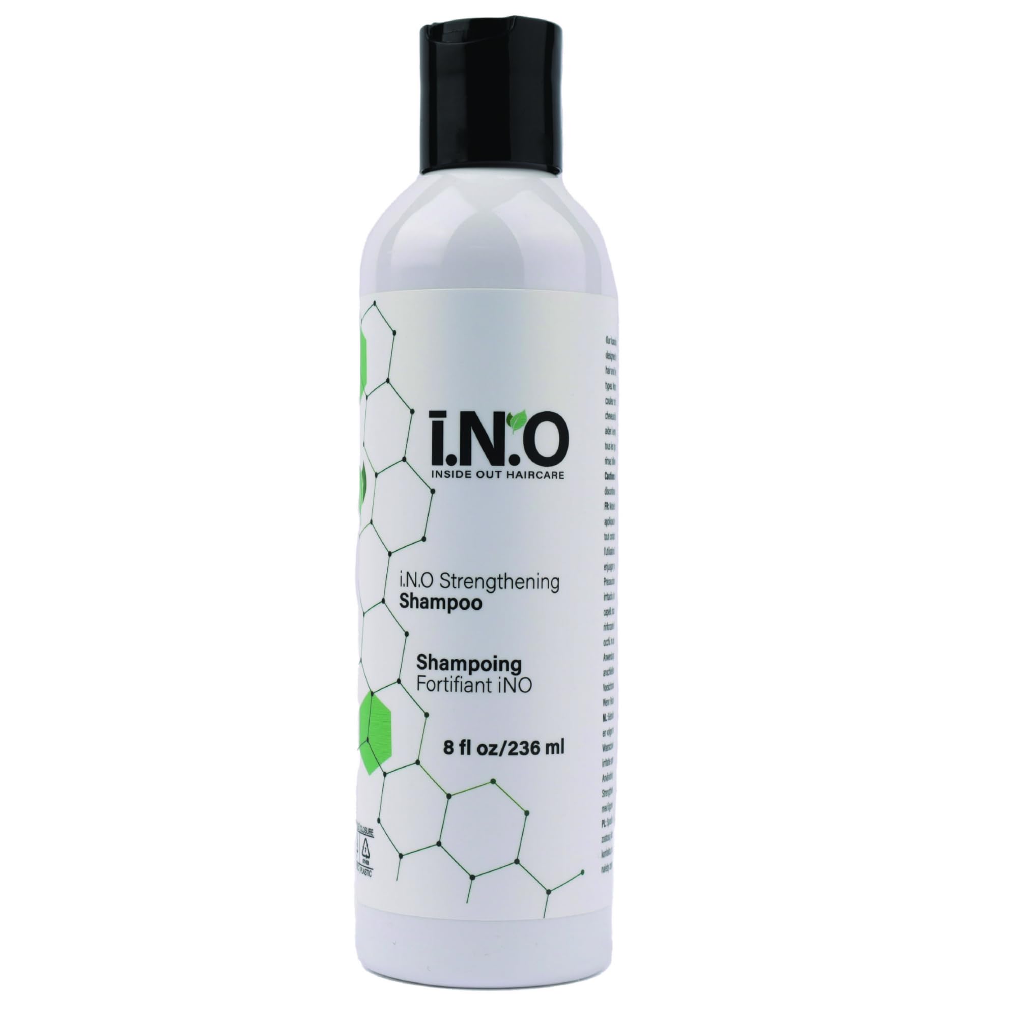 Earthly Body Inside Out Shampoo bottle closeup shows color-safe formula for all hair types.