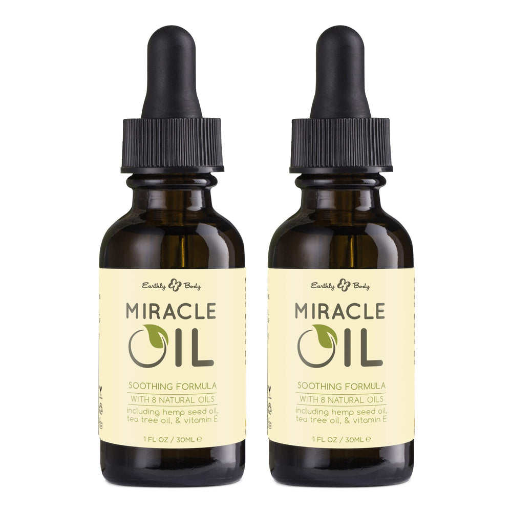 Earthly Body Miracle Oil bottle label highlights natural ingredients and vegan formula.