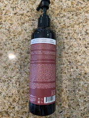 Earthly Body MKS Eco Endz Original Scent label close-up showing vegan, cruelty-free formula for frizz control