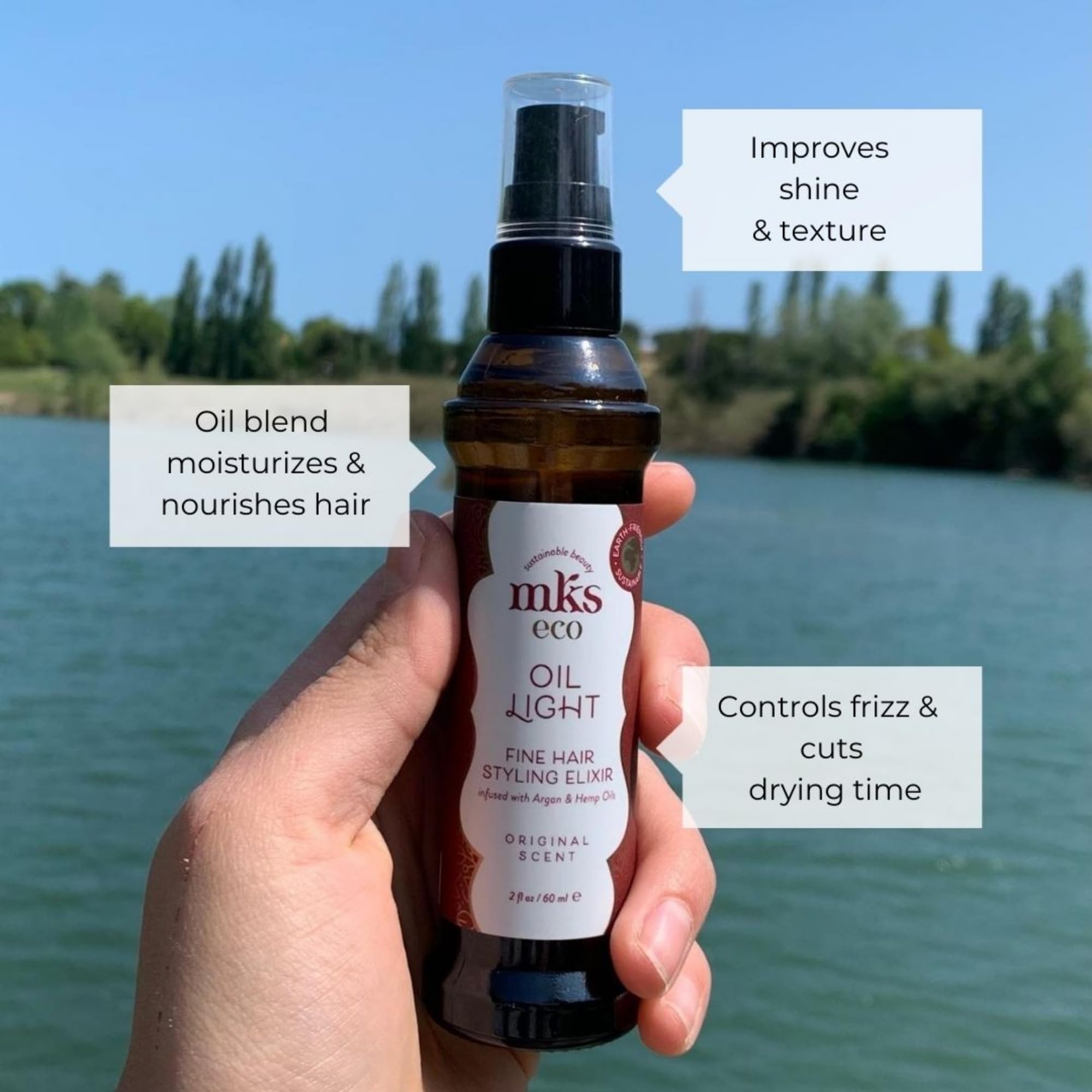 Earthly Body MKS Eco Hair Elixir on frizzed strands demonstrates frizz control.