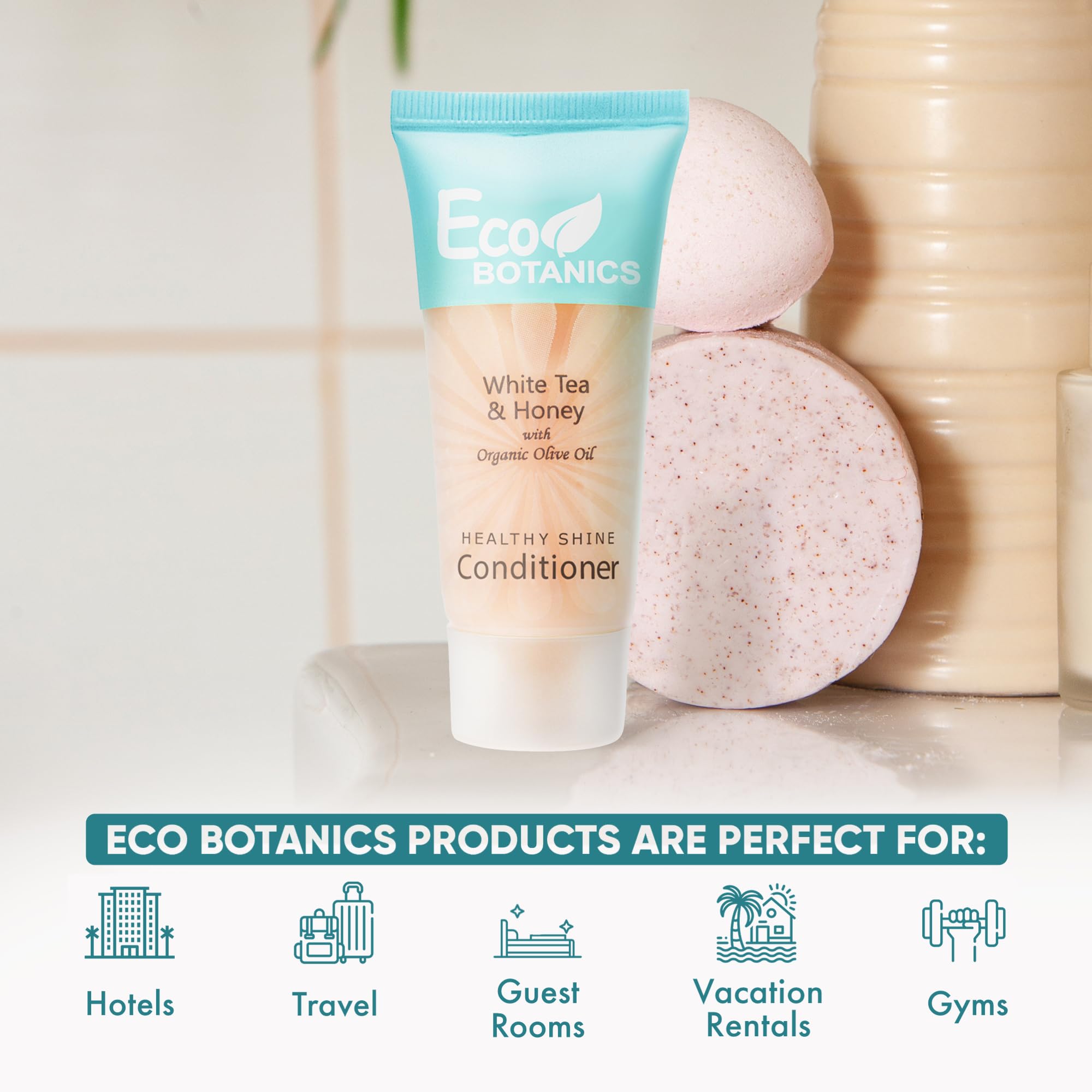 Eco Botanics conditioner bottle close-up highlighting compact 0.85 oz size for guests.
