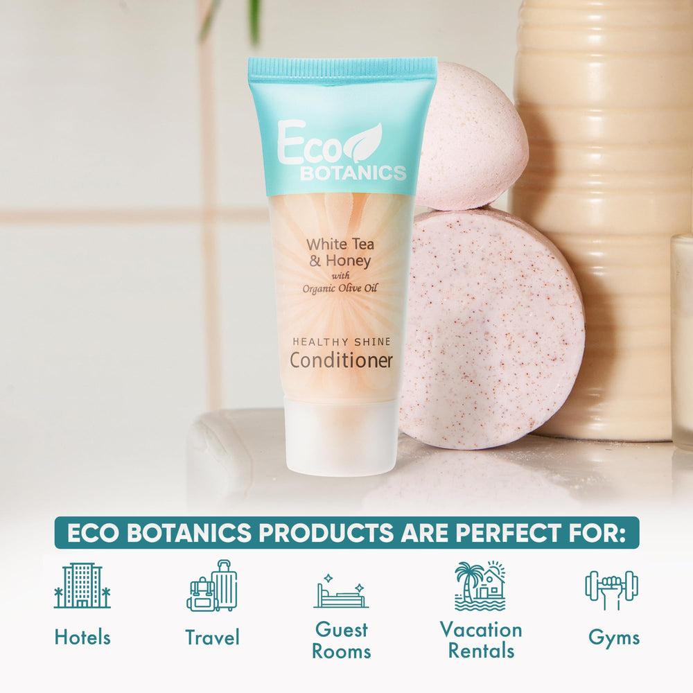 Eco Botanics conditioner bottle close-up highlighting compact 0.85 oz size for guests.