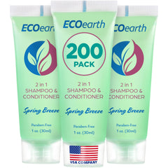 EcoEarth travel-size 2-in-1 bottle displayed in hotel bathroom for guests.
