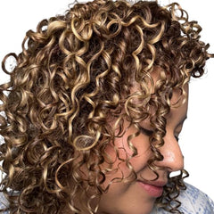 Ecoslay Orange Marmalade hands apply demonstrates quick styling for defined, bouncy curls.