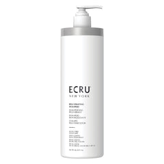 ECRU New York Rejuvenating Shampoo bottle close-up showing hydrating formula for refreshed hair.