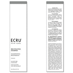 ECRU New York Rejuvenating Shampoo lather on hair delivering shine and smoothness.