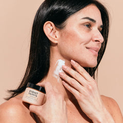 Applying Eight Saints neck cream to neck skin improves texture