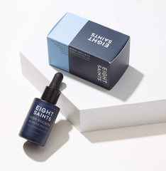 Eight Saints High Society Face Oil dropper pouring for quick absorption.