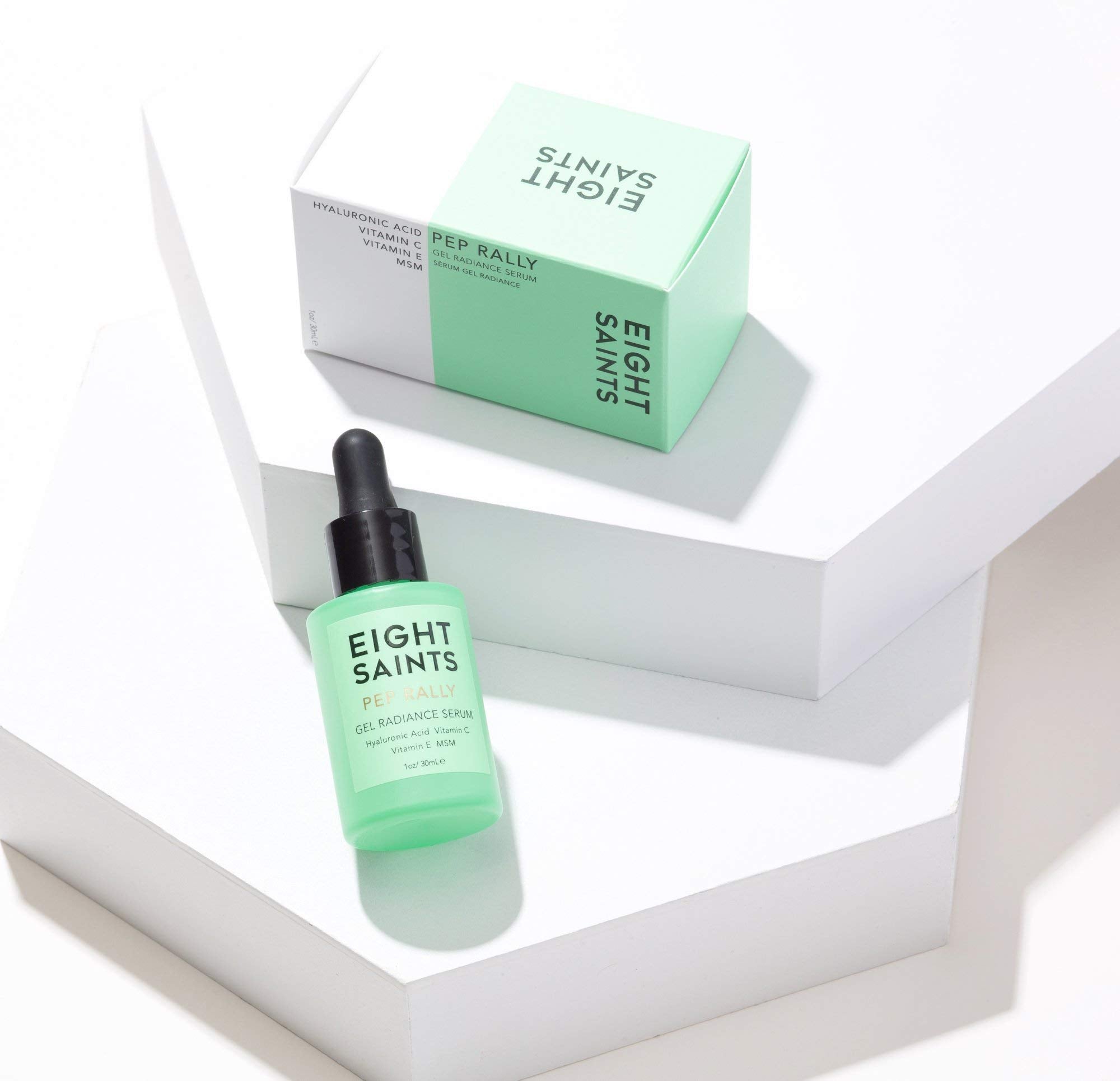 Dropper of Eight Saints serum delivering precise application for quick absorption.