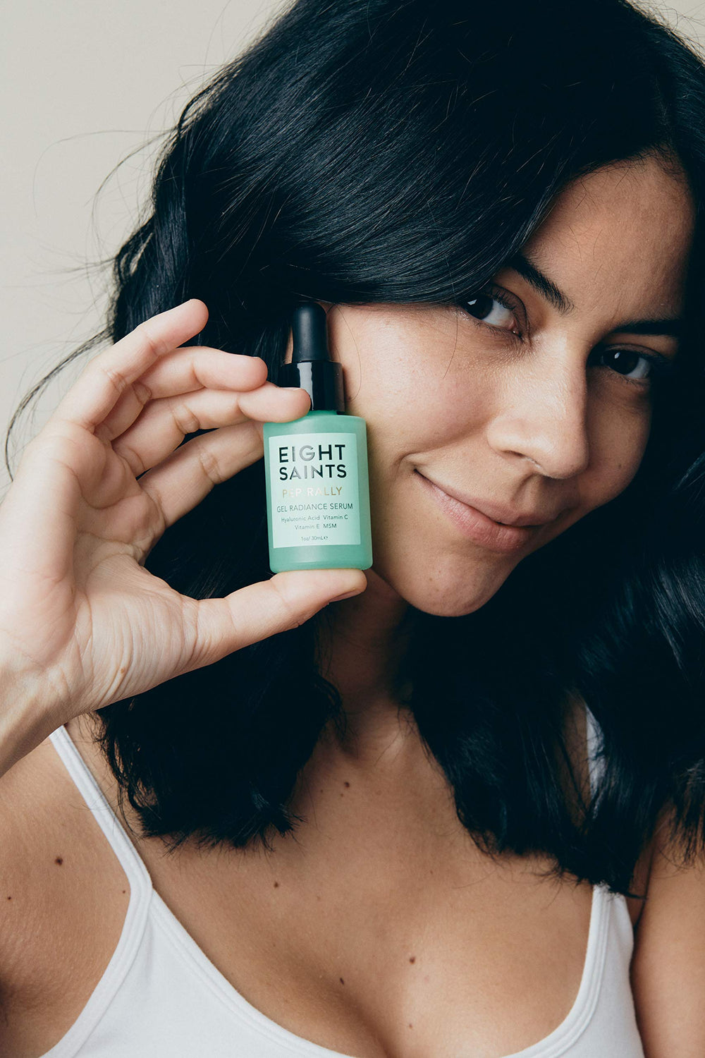 Close-up texture of Eight Saints serum highlighting a light, fast-absorbing gel.