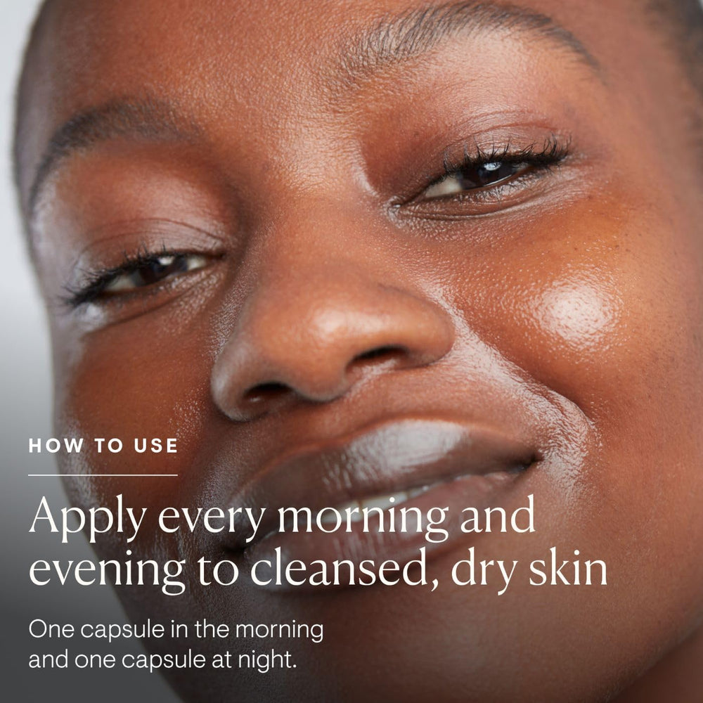ELEMIS Skin Bliss Capsules bottle on vanity with glow-enhancing results.