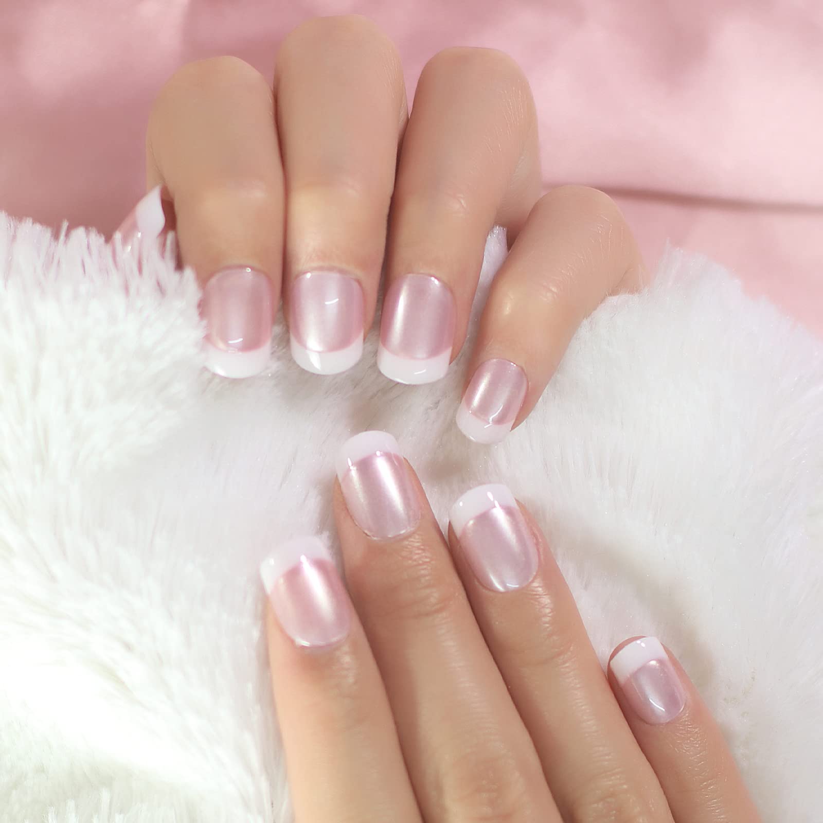 Elevenail glossy pearl pink and white nails on hand for a chic summer manicure