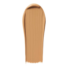 e.l.f. Hydrating Camo CC Cream swatch on skin demonstrating color correction for medium warm tone.