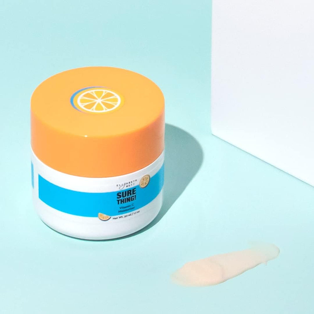 Texture close-up reveals Elizabeth Mott Vitamin C moisturizer gel-cream consistency.