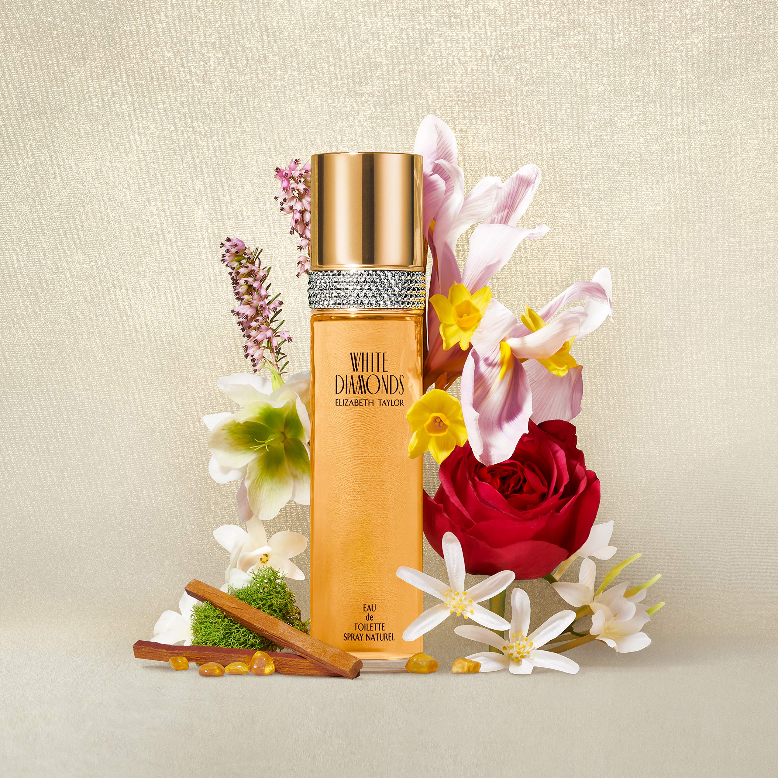Elizabeth Taylor White Diamonds body powder on skin shows soft, radiant touch.