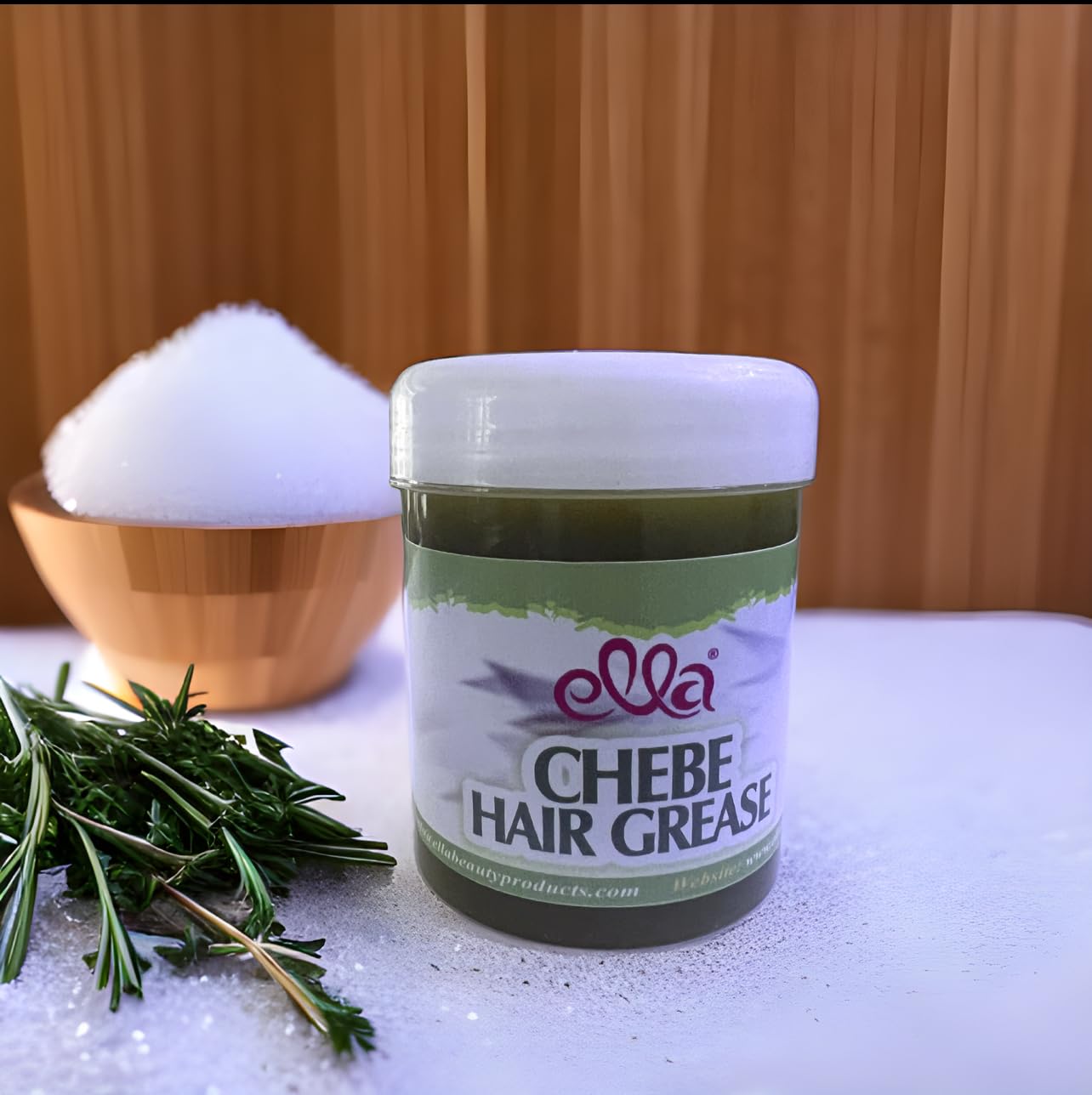 Ella Chebe hair grease cools scalp with peppermint and rosemary.