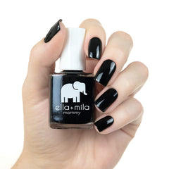 Nails swatched with Lights Out for a rich, deep black color.