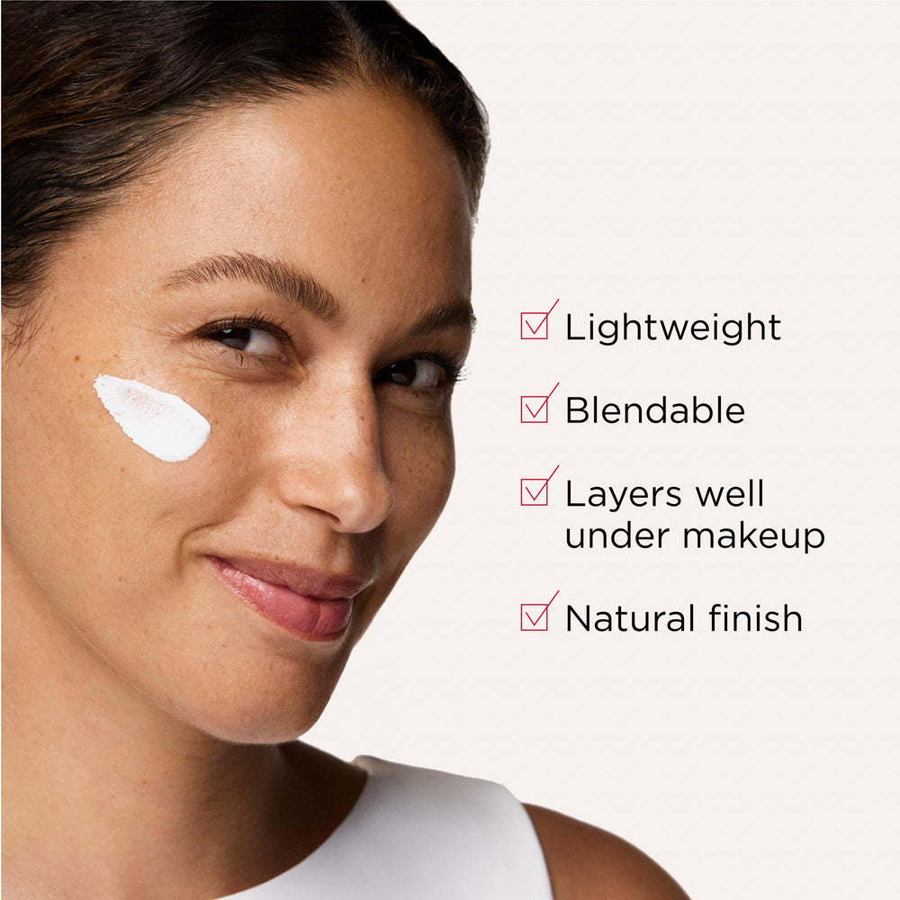 SPF 50 tube resting on a clean surface for portable daily protection image.