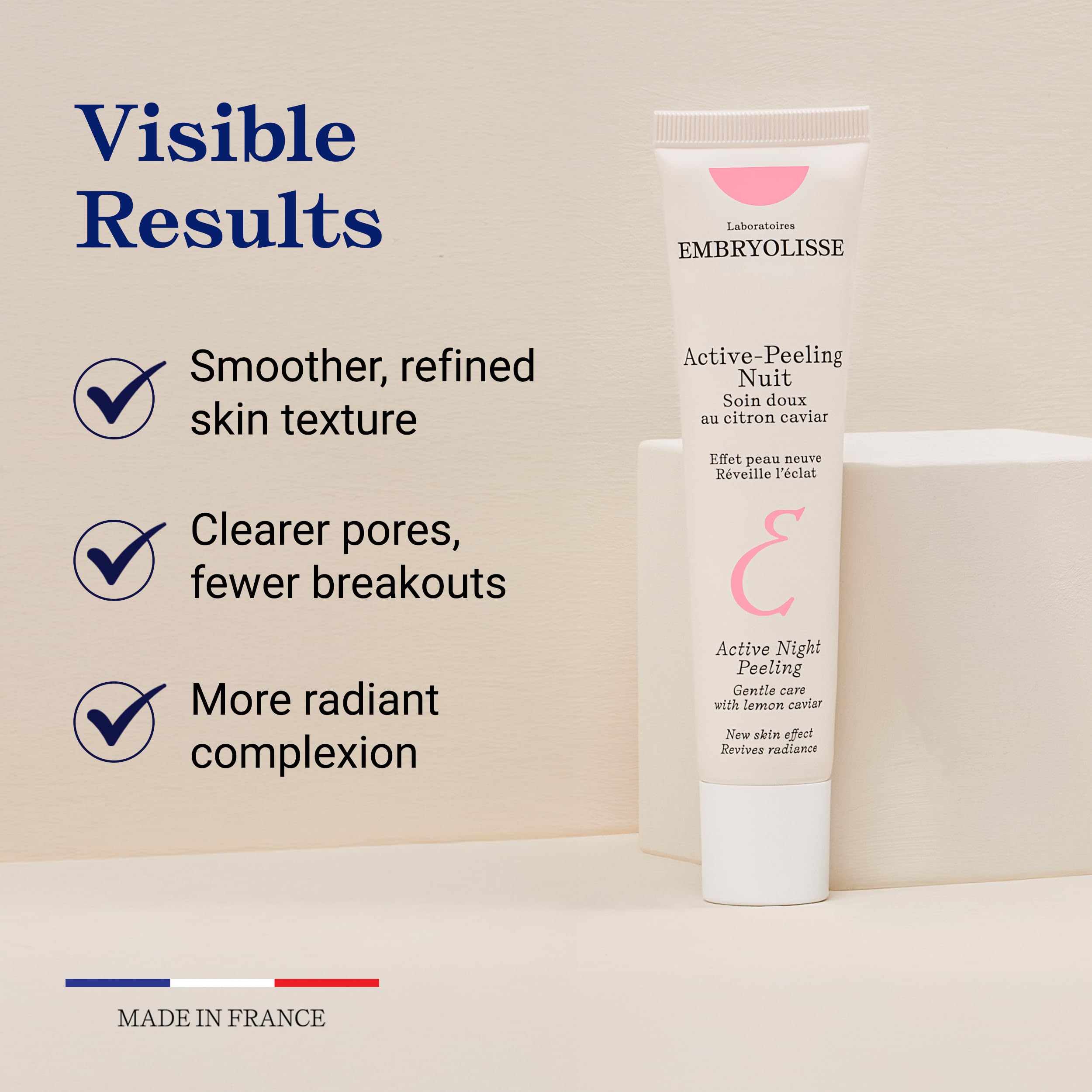 Embryolisse Active Night Peeling cream swirl on a neutral surface.