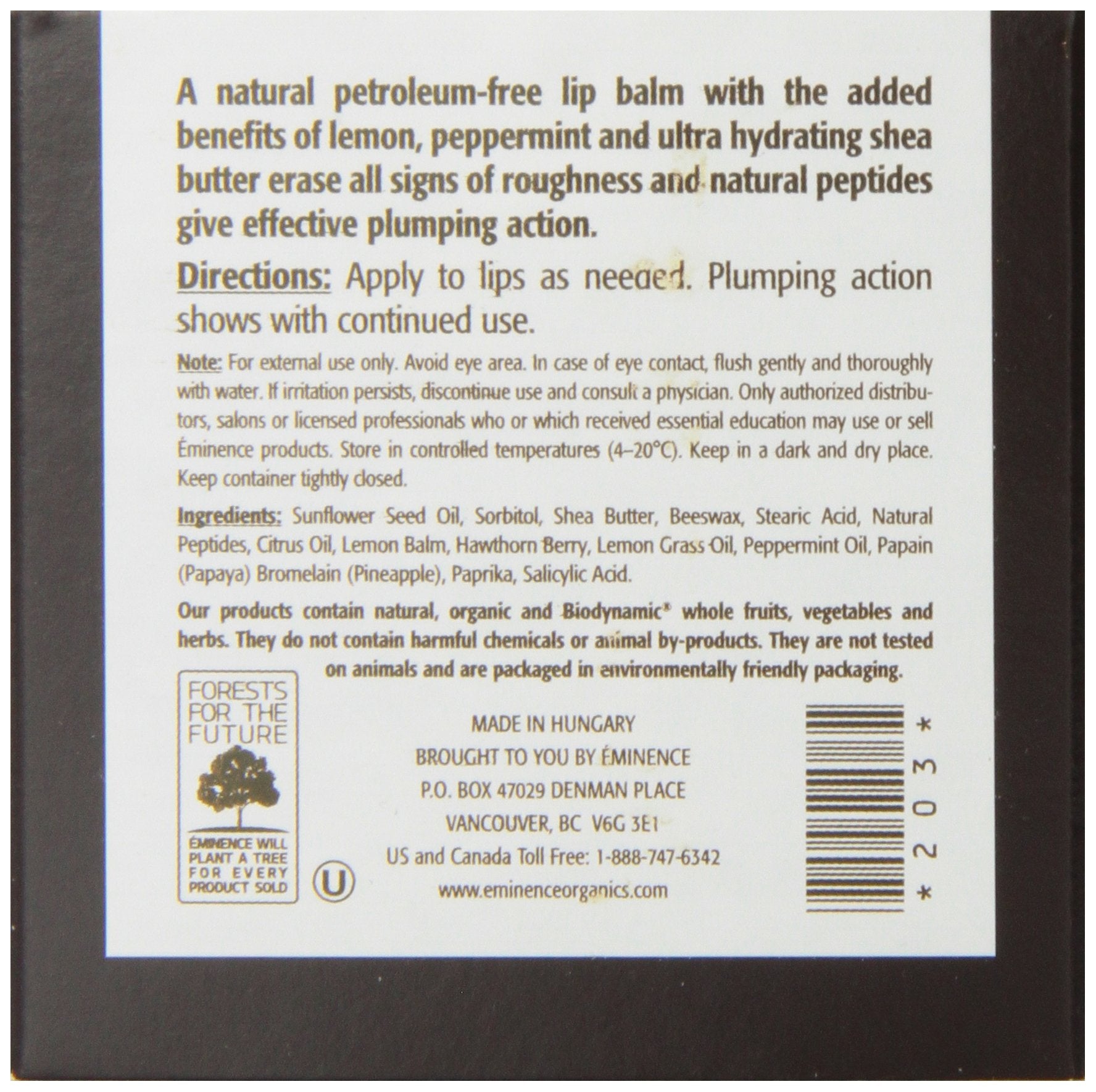 Close-up of Eminence Citrus Lip Balm texture shows creamy, nourishing consistency.