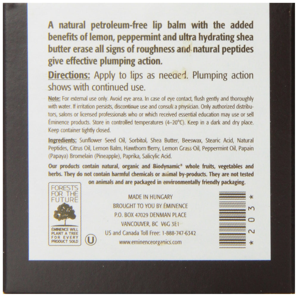 Close-up of Eminence Citrus Lip Balm texture shows creamy, nourishing consistency.