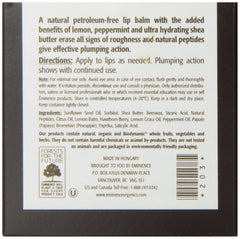 Close-up of Eminence Citrus Lip Balm texture shows creamy, nourishing consistency.