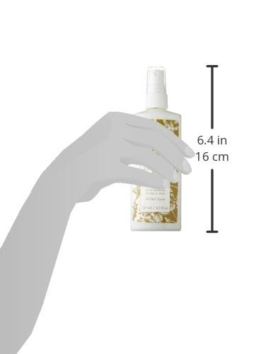 Close-up of Eminence Neroli Age Corrective Hydrating Mist ingredients: neroli, coconut milk, green apple.
