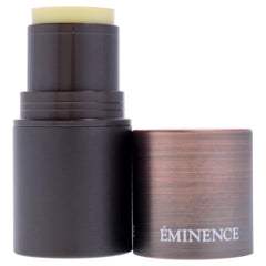 Eminence rosehip-oil close-up on lip balm tube highlighting hydration.