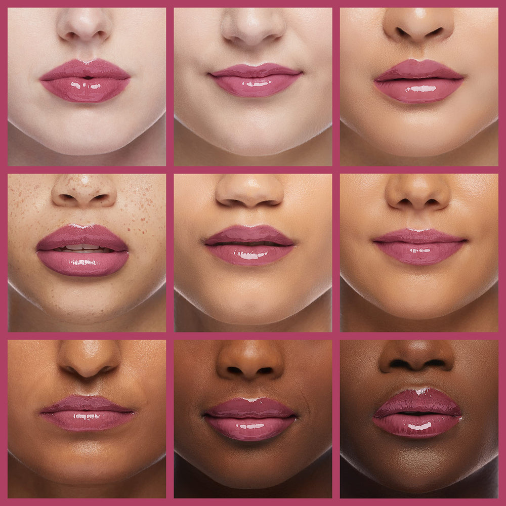 Close-up of gloss applicator with Enchante Ellen Tracy tubes