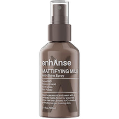 ENHANSE Mattifying Milk Anti Shine Spray bottle applying on skin for a matte finish.