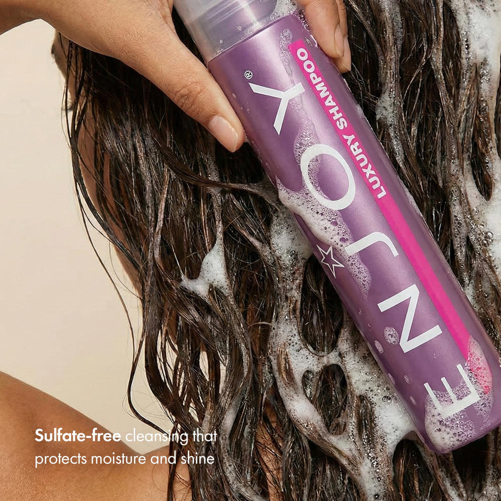 Enjoy Luxury Shampoo foamy lather demonstrates gentle cleansing and shine.