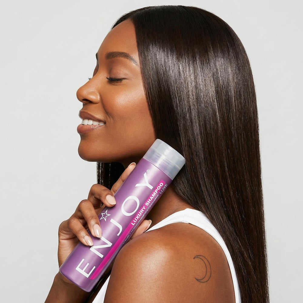 Enjoy Luxury Shampoo label closeup showcases sulfate-free formula.