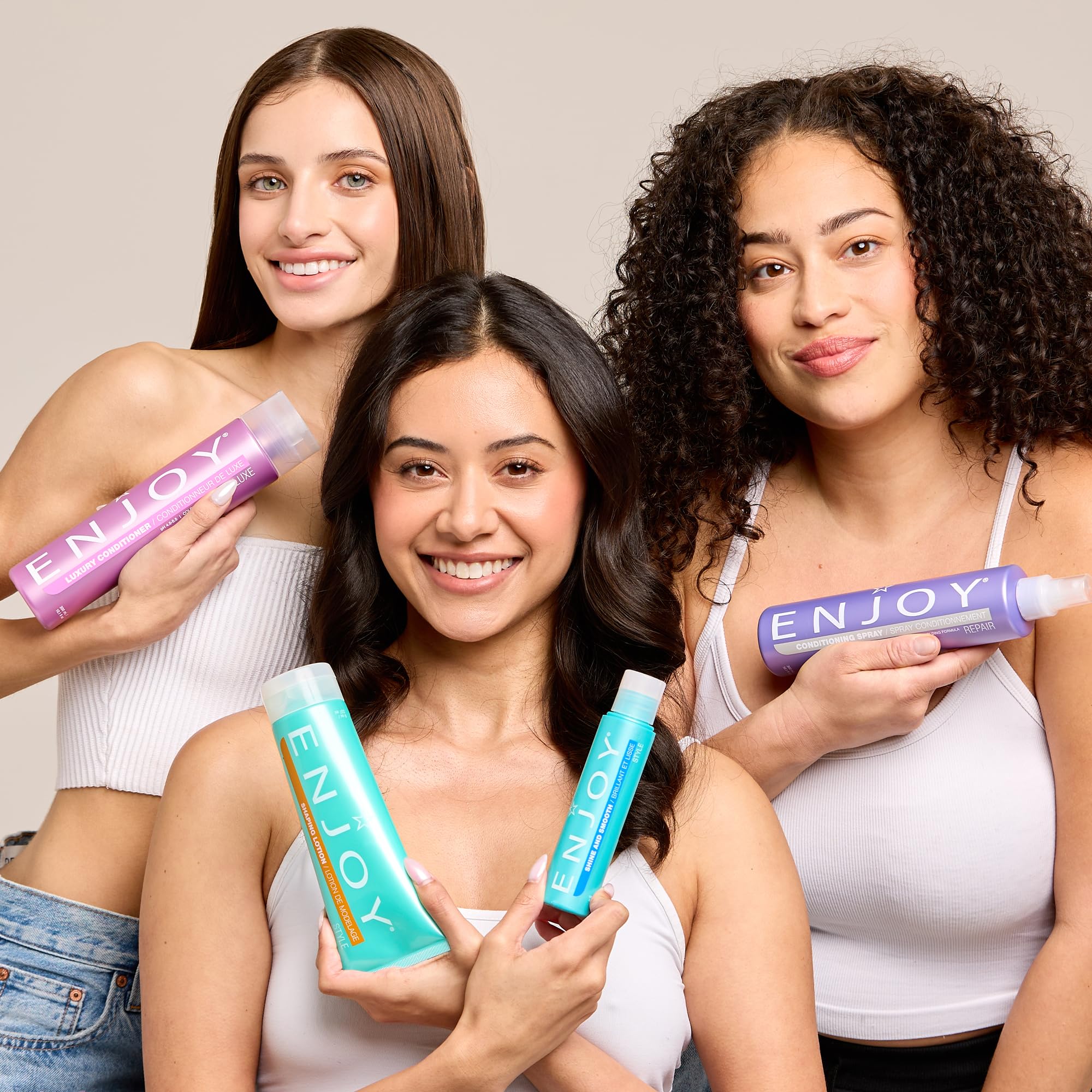 Enjoy Volume Shampoo travel-size bottle for on-the-go care.