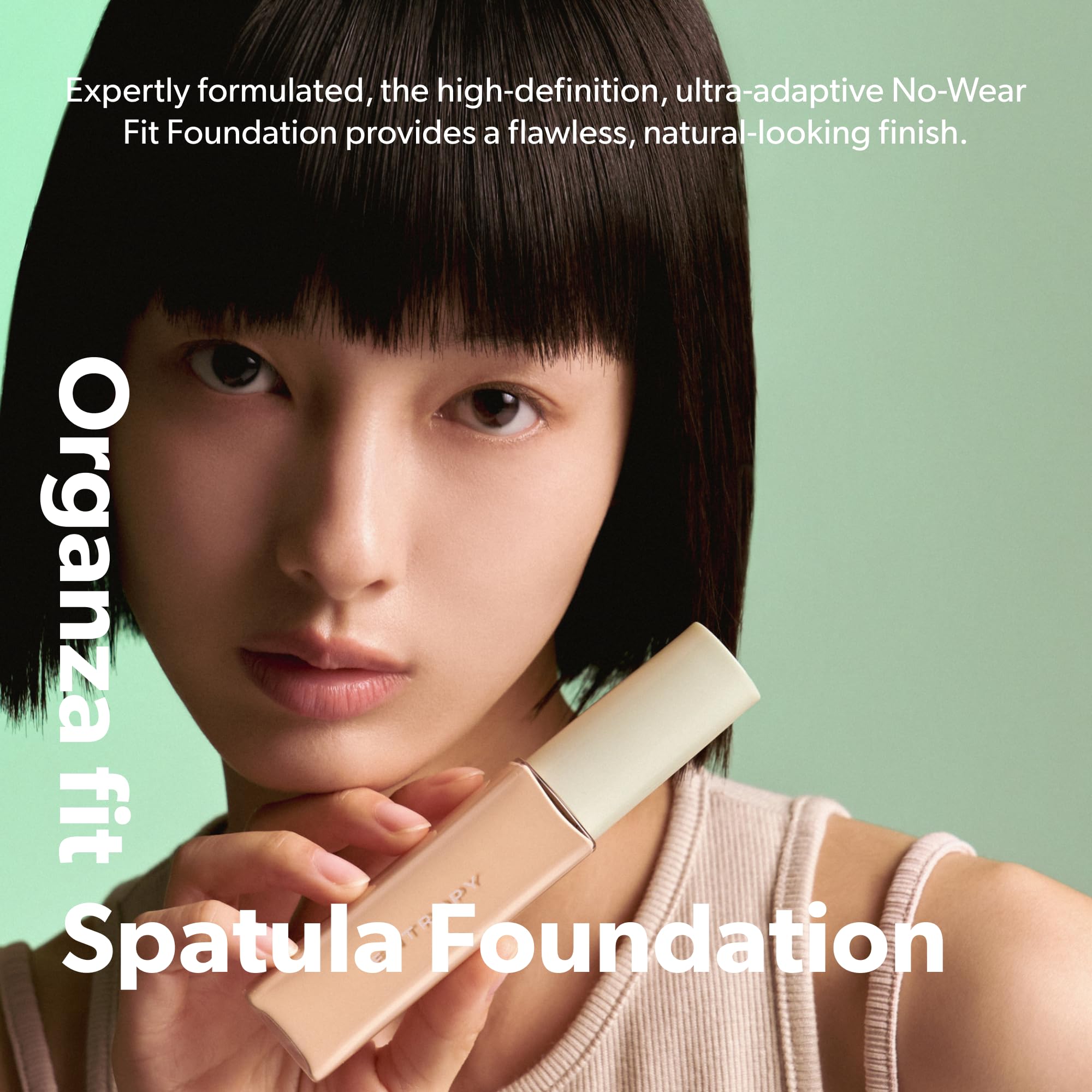 Close-up of Organza Fit spatula applicator delivering even coverage
