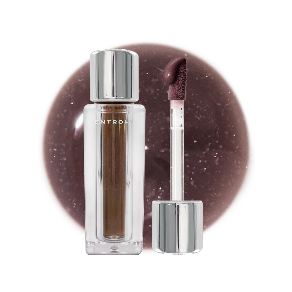 ENTROPY MAKE UP Tulle Lip Gloss bottle with lightweight veil and glow