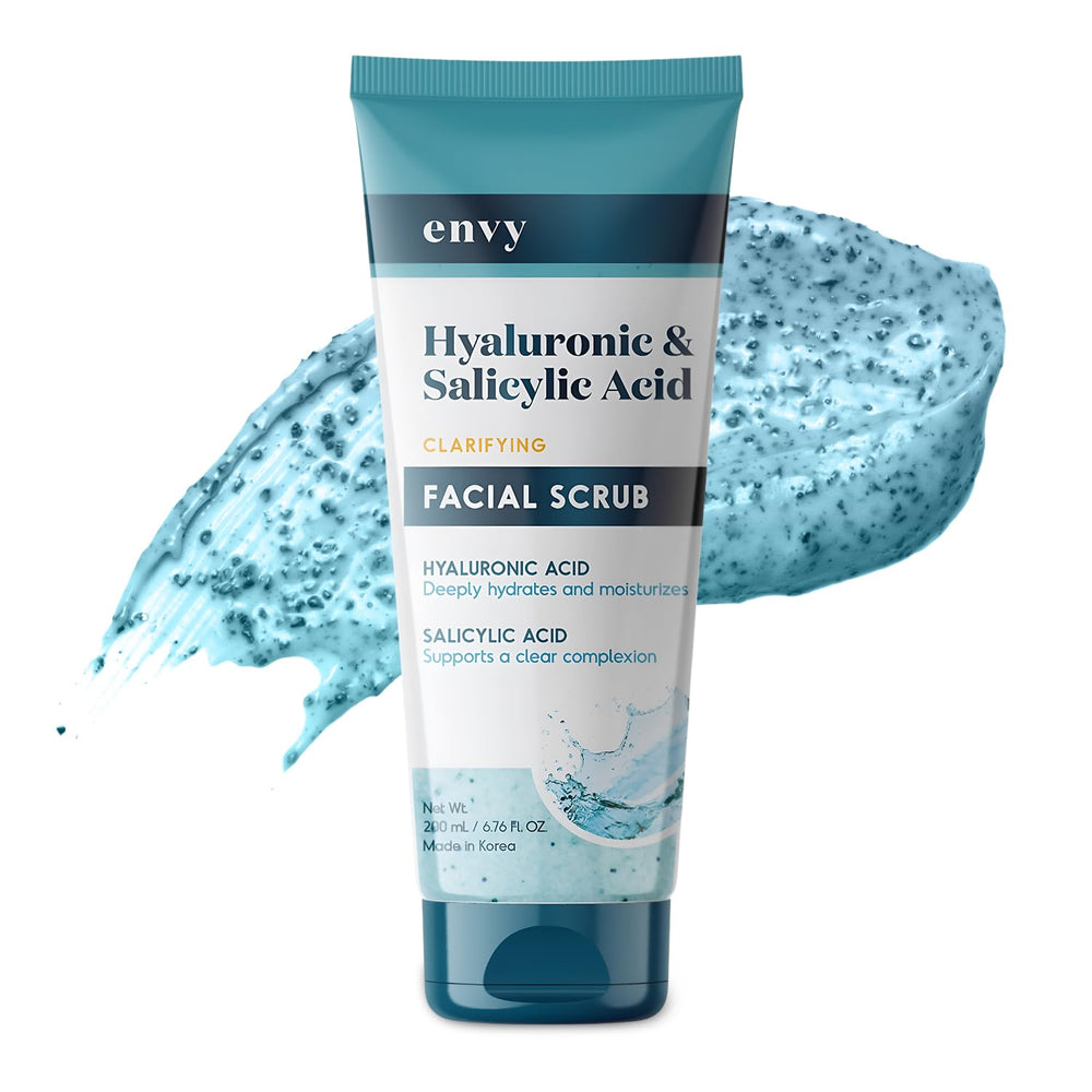 Envy face scrub bottle shows hydrating formula for a refreshed, dewy look.