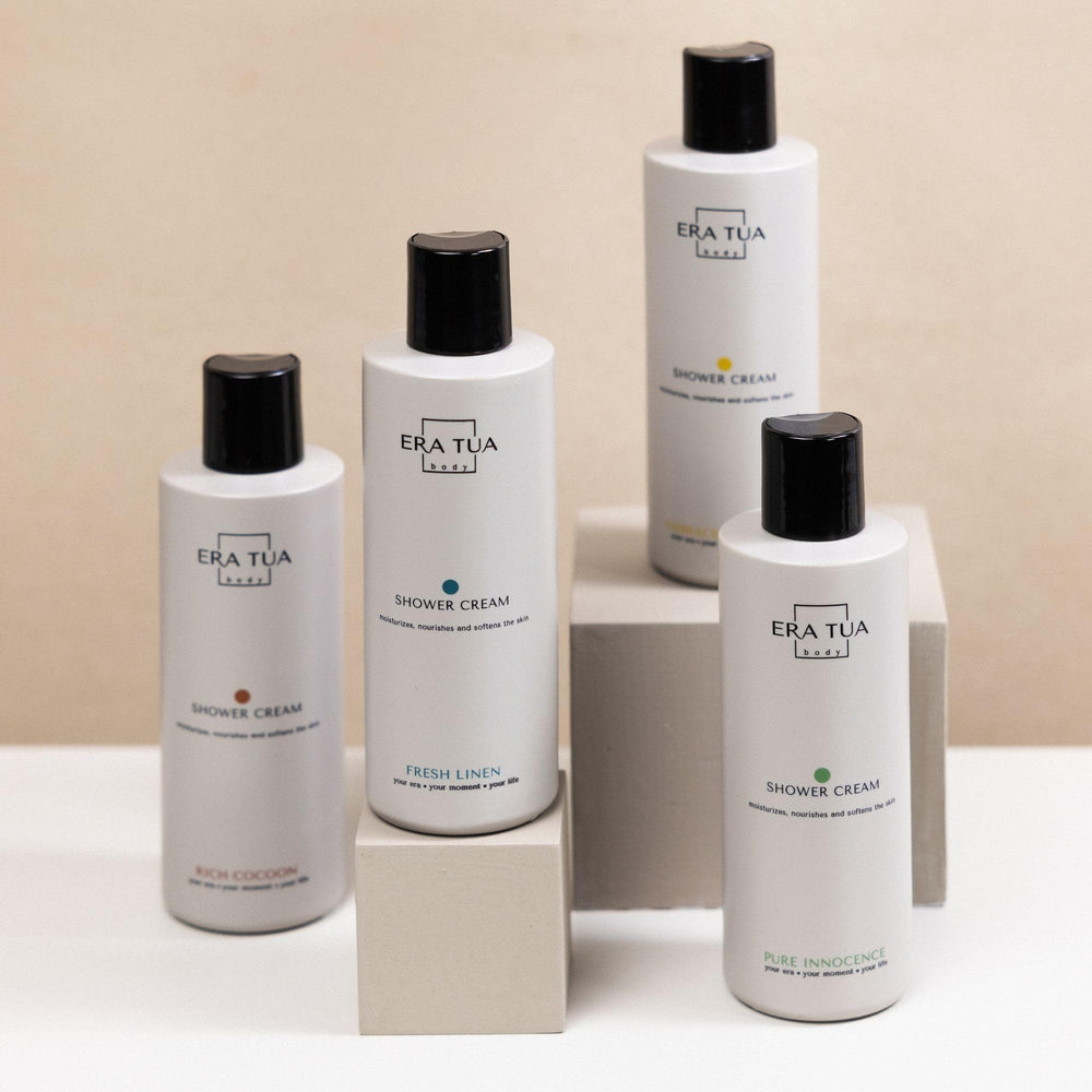 Era Tua Rich Cocoon shower cream foam suggests silky, radiant skin after use.
