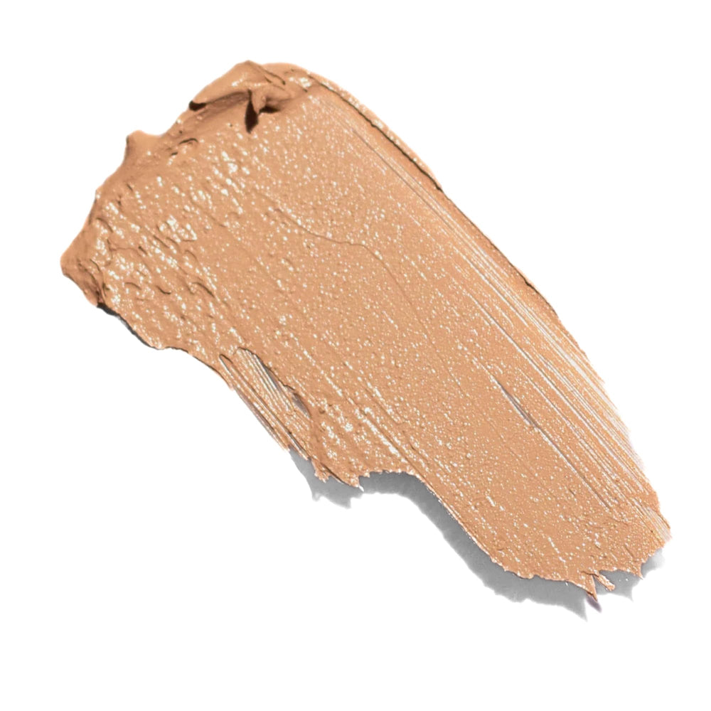Close-up of Ere Perez Arnica All-Cover Pot Concealer lid and texture showing medium to full coverage