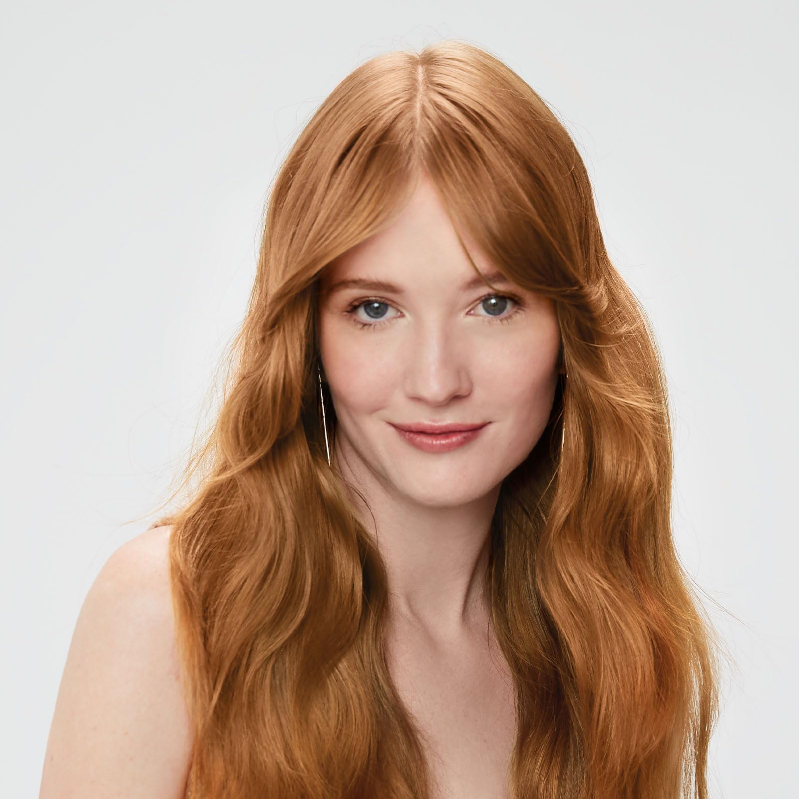 Esalon color developer bottle for precise at-home mixing and shade control.