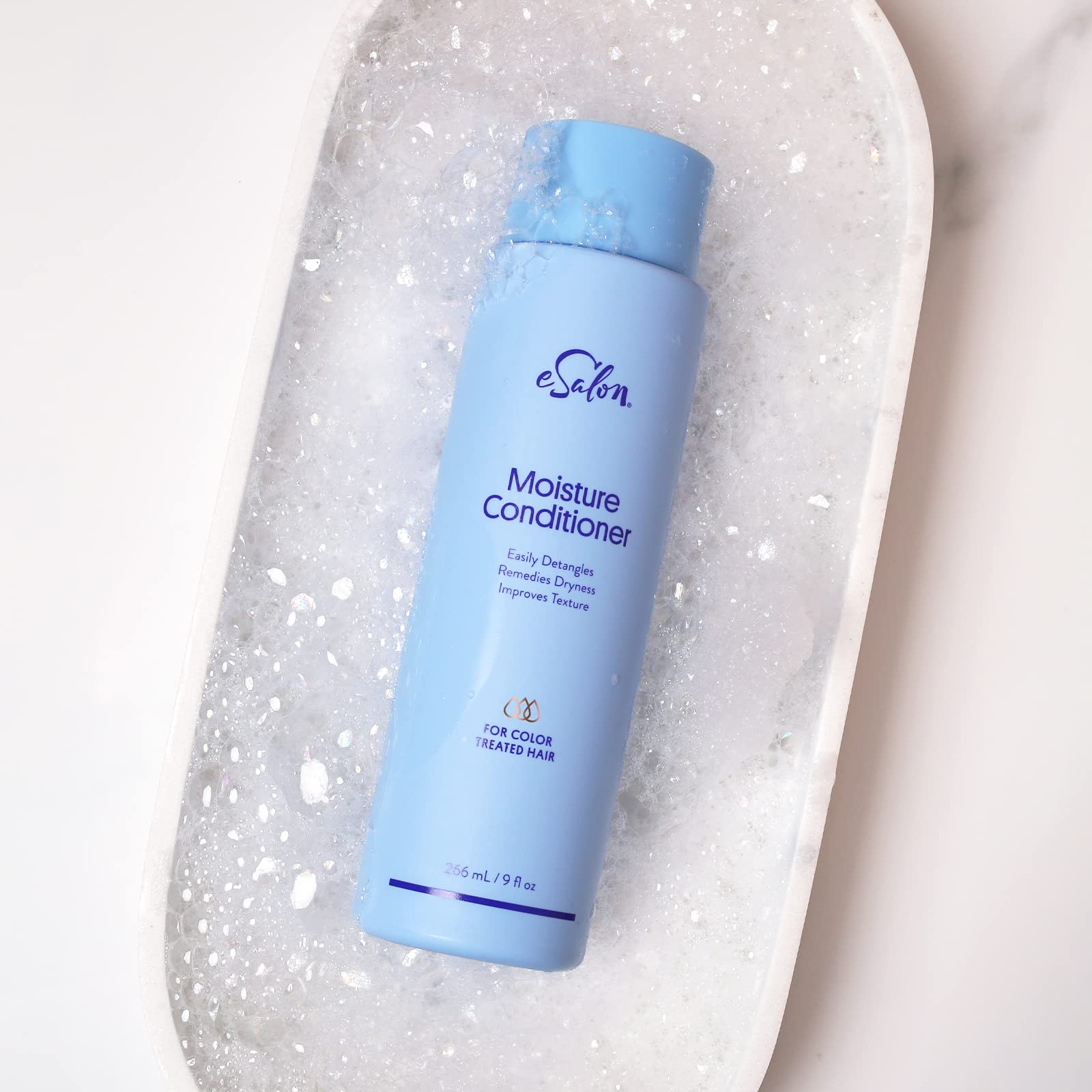Esalon Moisture Shampoo paired with conditioner for hydration.